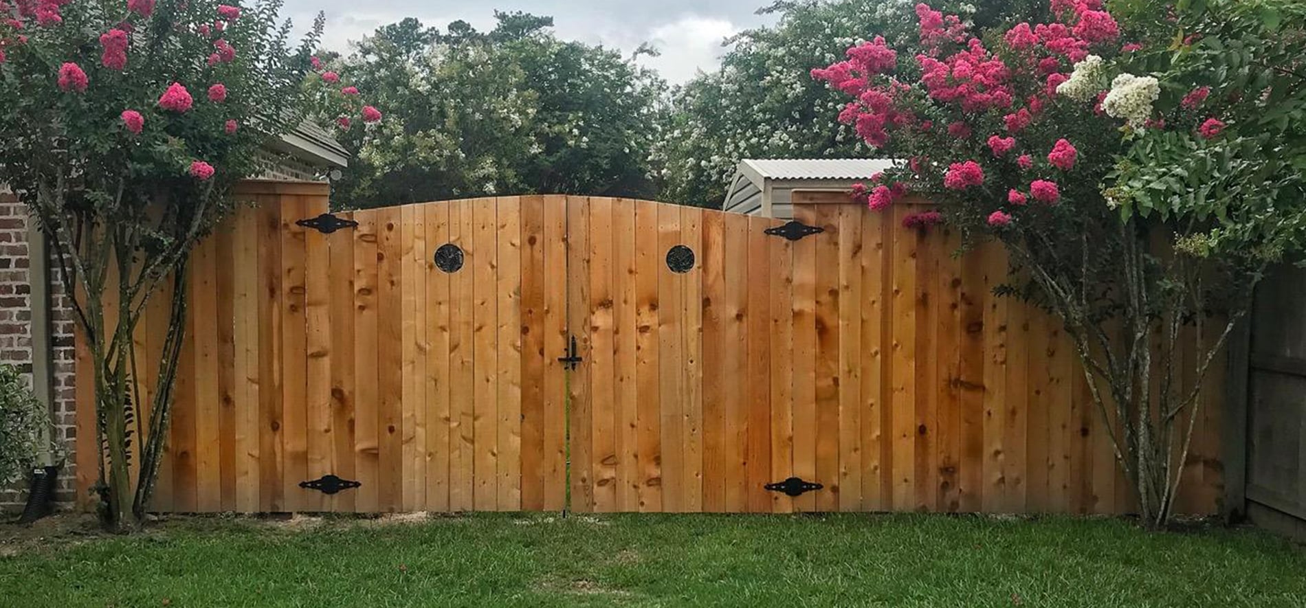 capped fence with arch gate and portholes AFTER